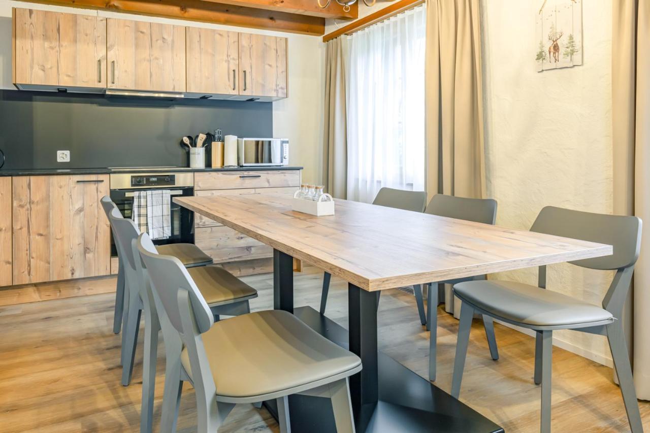 Apartment Eiger - Aare Jungfrau Ag Grindelwald Exteriör bild